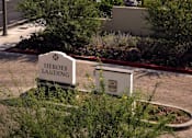 Thumbnail 55 of 114 - A sign that says Heroes Landing is in front of a building.