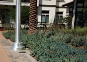 Thumbnail 48 of 114 - A walkway with a plaque on it.