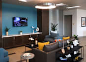 Thumbnail 33 of 103 - A modern living room with a grey sofa, a coffee table, and a TV mounted on the wall.