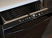 Thumbnail 101 of 103 - A black oven with a digital display and control panel.