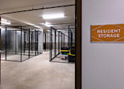 Thumbnail 84 of 103 - A storage room with a sign that says "Resident Storage".
