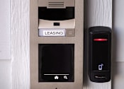 Thumbnail 29 of 94 - A leasing box with a keypad and a remote.