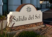 Thumbnail 81 of 90 - Salida del Sol sign in front of a building.