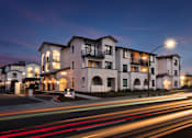 Thumbnail 5 of 61 - A long exposure shot of a building with a street in front of it.