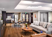 Thumbnail 113 of 127 - A modern living room with a grey couch and a wooden coffee table.
