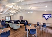 Thumbnail 94 of 127 - A conference room with a logo on the wall.