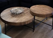 Thumbnail 99 of 127 - A wooden coffee table with a glass bowl on top.