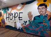 Thumbnail 70 of 127 - A mural with the word "HOPE" written on it.