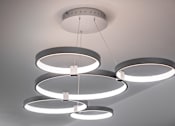 Thumbnail 38 of 127 - A modern chandelier with circular lights hanging from the ceiling.