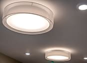 Thumbnail 42 of 127 - Two ceiling lights are on.