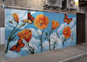 Thumbnail 2 of 127 - A mural of orange flowers and butterflies painted on a wall.
