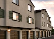 Thumbnail 95 of 117 - A row of modern townhouses with garages on the ground floor.