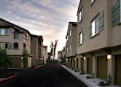Thumbnail 103 of 117 - A long street with apartment buildings on both sides.