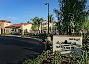 Thumbnail 61 of 117 - The entrance to The Acre at Woodbury, a residential community.