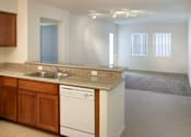 Thumbnail 108 of 117 - A kitchen with a washer and dryer built in.
