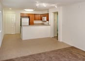 Thumbnail 109 of 117 - A kitchen area with a counter and cabinets.