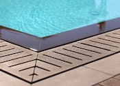 Thumbnail 17 of 45 - A pool with a brown border.