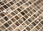 Thumbnail 25 of 45 - A close up of a brown and beige marble mosaic tile.