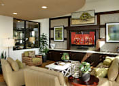 Thumbnail 110 of 126 - A living room with a couch, chair, and a television.