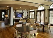 Thumbnail 115 of 126 - A modern dining room with a large table and chairs.
