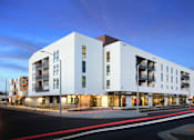 Thumbnail 5 of 17 - A modern white building with the number 2024 on it.