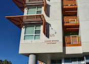 Thumbnail 88 of 94 - A modern building with a staircase leading to the entrance.