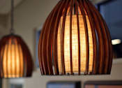 Thumbnail 84 of 94 - Two hanging lamps with a warm glow.