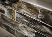 Thumbnail 82 of 94 - A close up of a marble tile wall.