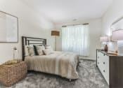 Thumbnail 12 of 44 - bedroom with bed and dresser at Cumberland Crossing, Cumberland, 02864