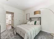 Thumbnail 13 of 44 - a bedroom with a large bed and a closet  at Cumberland Crossing, Cumberland, 02864