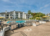 Thumbnail 14 of 17 - Grilling Area next to Pool at Middletown Ridge Apartments, Middletown, 06457