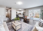 Thumbnail 6 of 14 - an open living room and kitchen with a sliding glass door at Pleasant View Estates, Connecticut