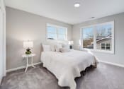 Thumbnail 13 of 14 - a bedroom with a bed and two windows at Pleasant View Estates, Connecticut