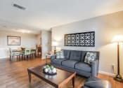 Thumbnail 5 of 17 - Spacious Living Room with Dining Room  at Middletown Ridge Apartments, Middletown, Connecticut