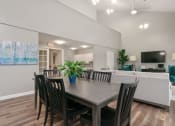 Thumbnail 9 of 57 - A dining room with a table and chairs. at South Winds Apartments, Fall River, 02720