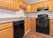 Thumbnail 33 of 57 - Fully Furnished Kitchen at South Winds Apartments, Massachusetts
