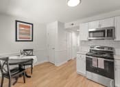 Thumbnail 13 of 15 - a photo of a kitchen and dining room