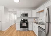 Thumbnail 11 of 15 - a photo of a kitchen