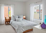 Thumbnail 7 of 32 - The Scott furnished bedroom