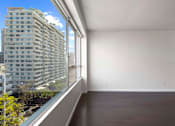 Thumbnail 37 of 49 - A room with a large window overlooking a cityscape. at The View, California