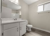 Thumbnail 24 of 24 - a bathroom with a sink and a toilet