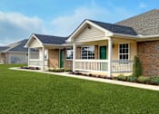 Thumbnail 1 of 15 - A house with a green door and a white porch.