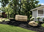 Thumbnail 2 of 42 - A large stone with the words Olympic Reserve to the left of a mailbox area.