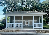 Thumbnail 2 of 36 - a white gazebo with a porch and some trees