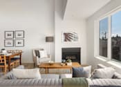 Thumbnail 2 of 39 - a view of the living room and dining area in a 555 waverly unit