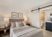 Thumbnail 34 of 39 - a bedroom with a bed and two night stands
