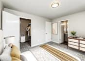 Thumbnail 6 of 15 - A well-lit, modern bedroom with a large bed and a dresser.
