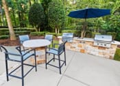 Thumbnail 13 of 27 - Patio with BBQ Area at The Estates at Ballantyne, Charlotte, North Carolina, 28277