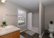 Thumbnail 20 of 31 - model bathroom with tub