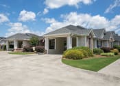 Thumbnail 22 of 31 - building exterior with carport